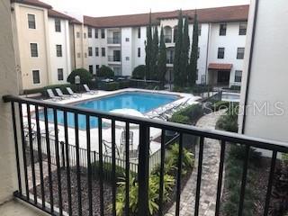 5550 East Michigan Street, Unit 3232 Orlando, FL 32822 - Photo 20 of 21 a view of a balcony with chairs