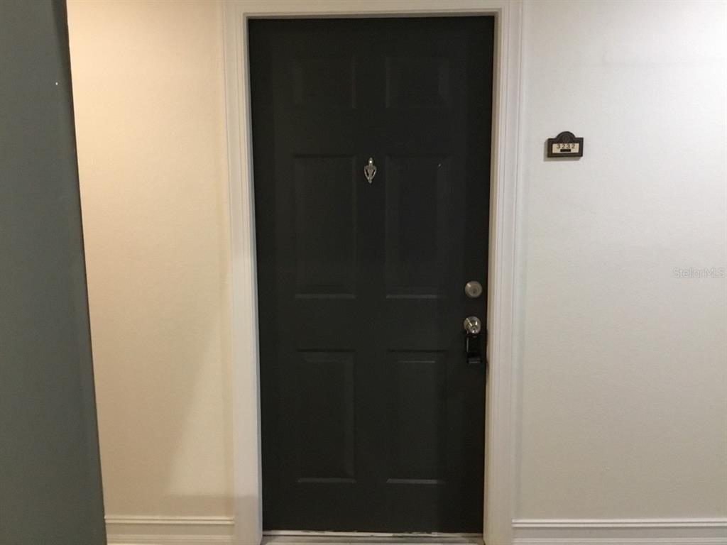 5550 East Michigan Street, Unit 3232 Orlando, FL 32822 - Photo 5 of 21 a bathroom with a glass door
