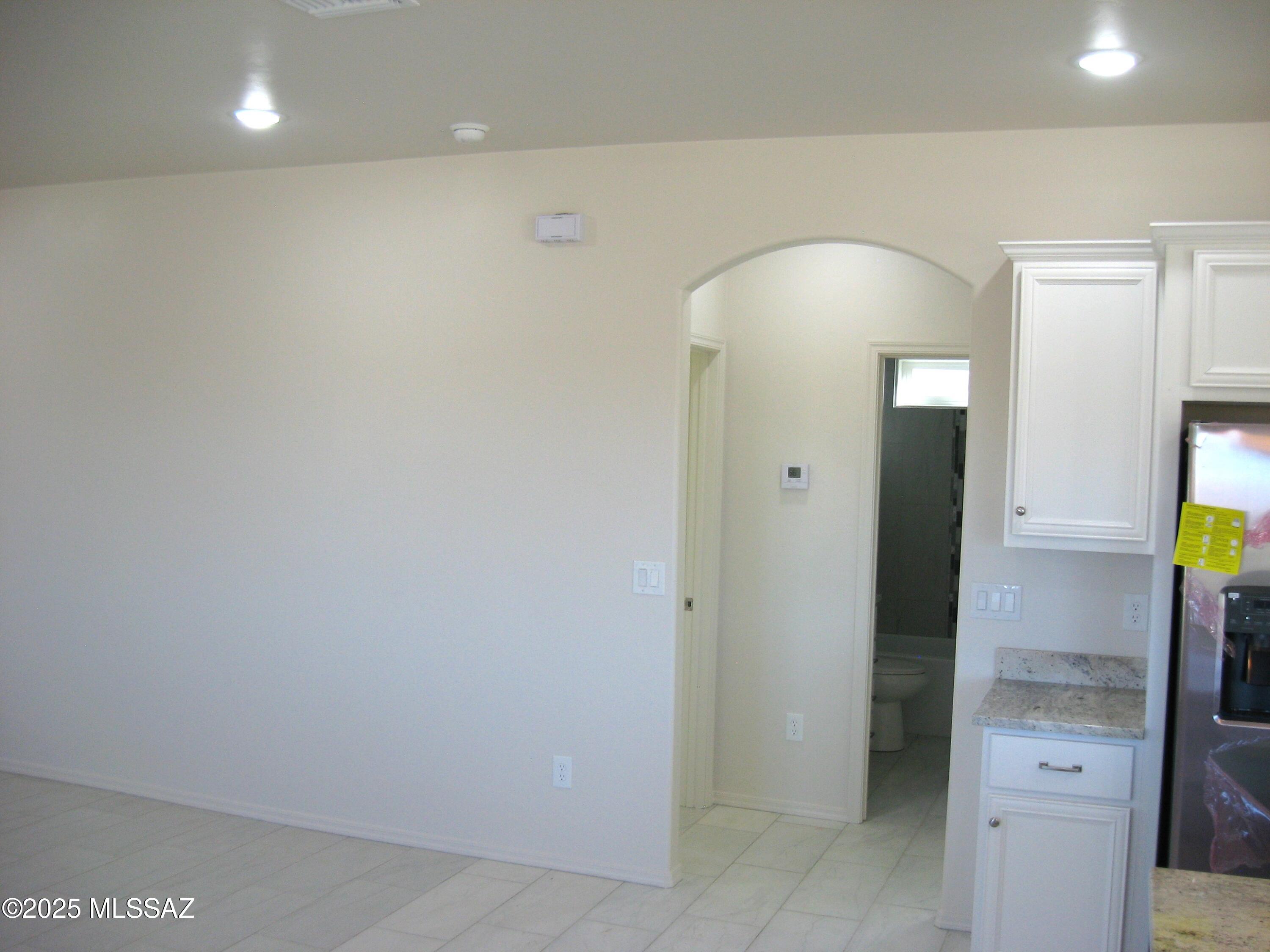1734 Circulo Badajada Rio Rico, AZ 85648 - Photo 9 of 32 a bathroom with a sink and a mirror