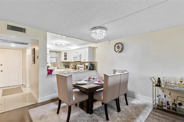 a view of a dining room with furniture