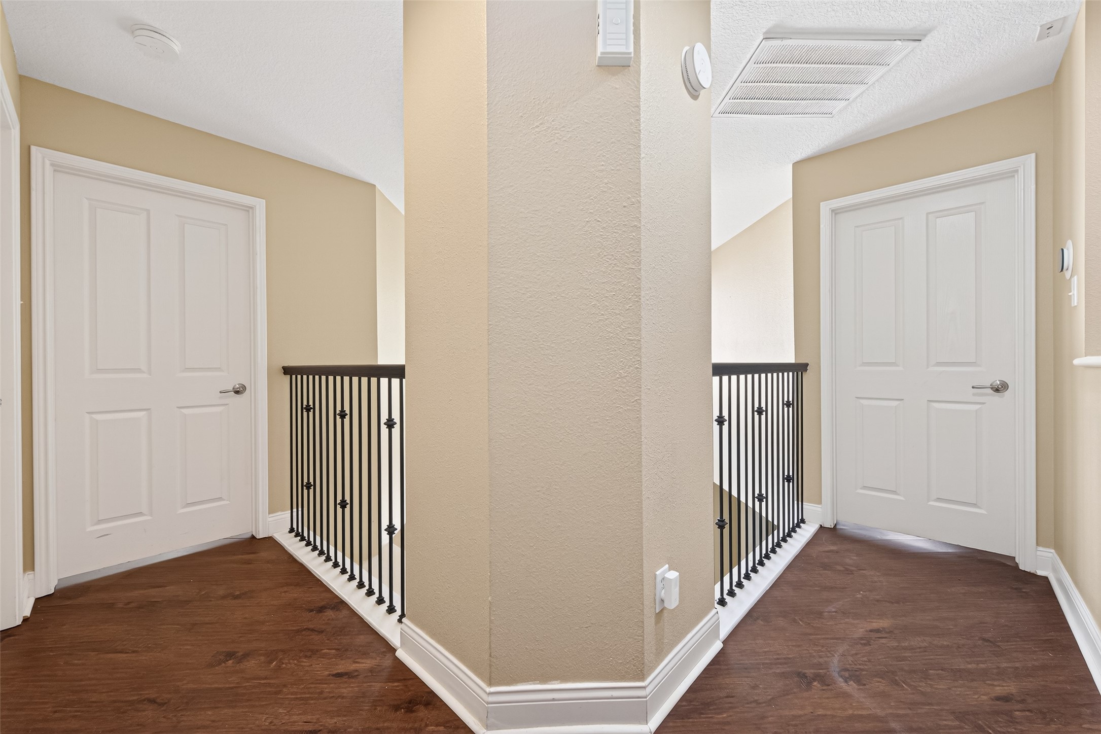 65 Scarlet Woods Court Spring, TX 77380 - Photo 16 of 36 a view of a hallway with wooden floor and entryway