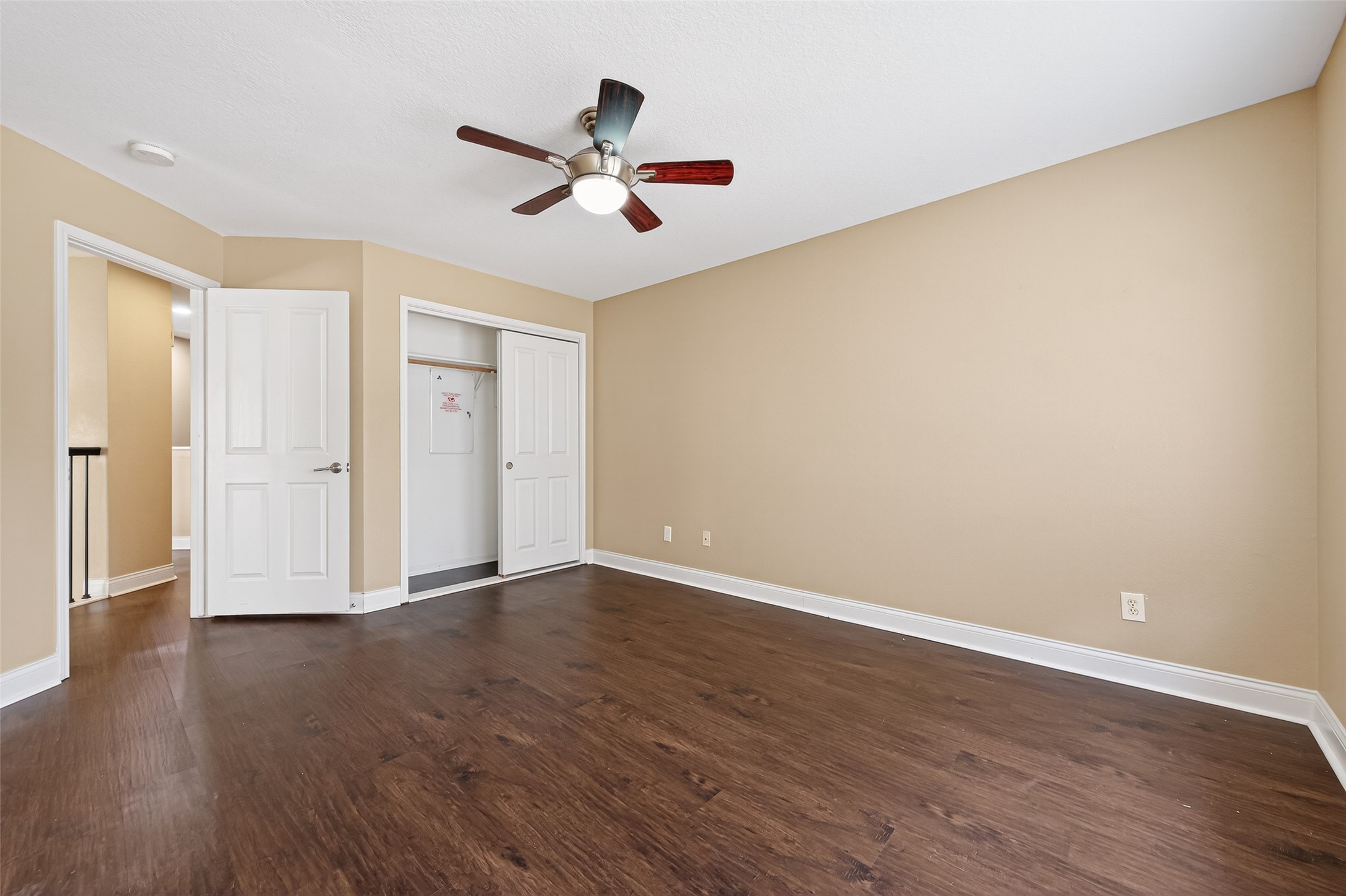 65 Scarlet Woods Court Spring, TX 77380 - Photo 18 of 36 a view of an empty room with wooden floor