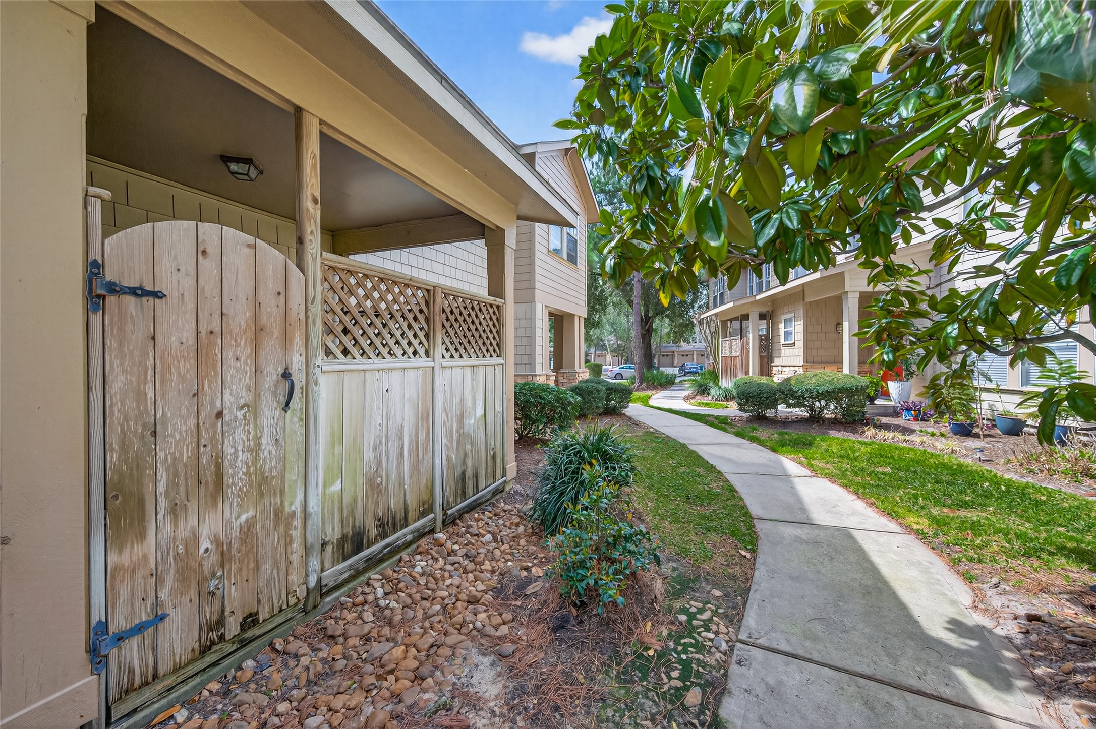 65 Scarlet Woods Court Spring, TX 77380 - Photo 34 of 36 a view of a house with a yard