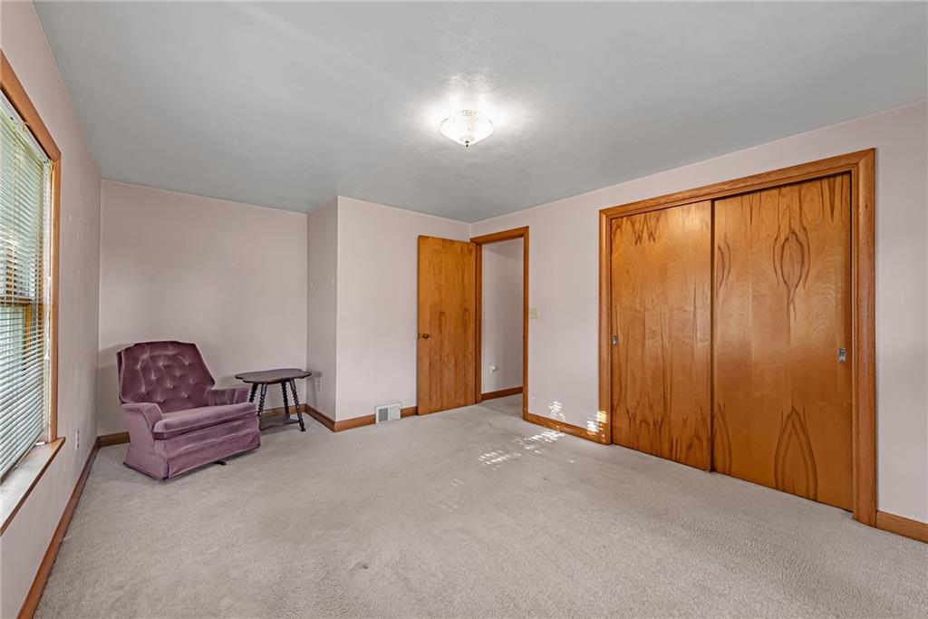 4931 North Rt, Unit 982 Latrobe, PA 15650 - Photo 13 of 22 a living room with furniture and a window