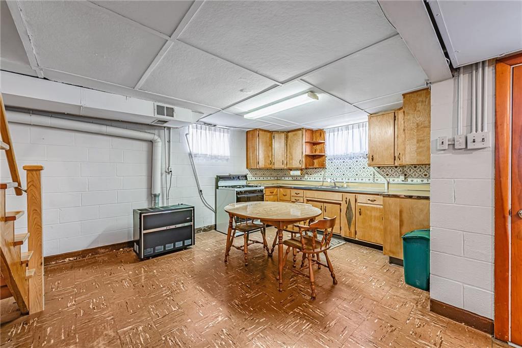4931 North Rt, Unit 982 Latrobe, PA 15650 - Photo 15 of 22 a kitchen with stainless steel appliances granite countertop a sink a stove and refrigerator