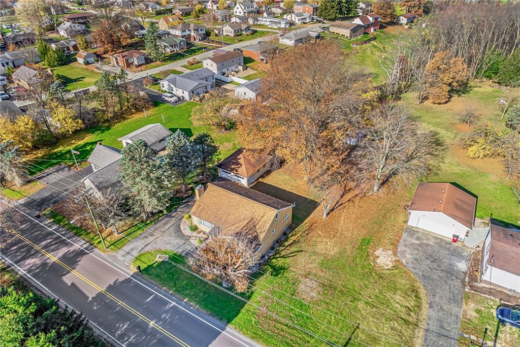 4931 North Rt, Unit 982 Latrobe, PA 15650 - Photo 21 of 22 an aerial view of a house with a yard
