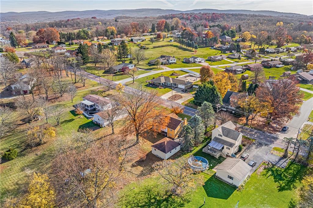 4931 North Rt, Unit 982 Latrobe, PA 15650 - Photo 22 of 22 an aerial view of residential houses with outdoor space