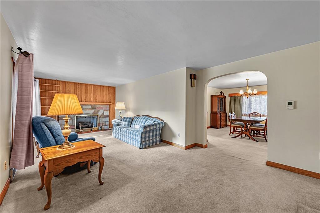 4931 North Rt, Unit 982 Latrobe, PA 15650 - Photo 4 of 22 a living room with furniture and a fireplace