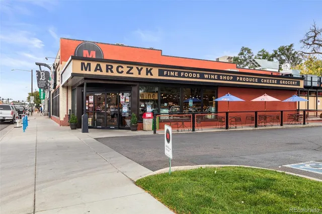a view of a car park in front of building