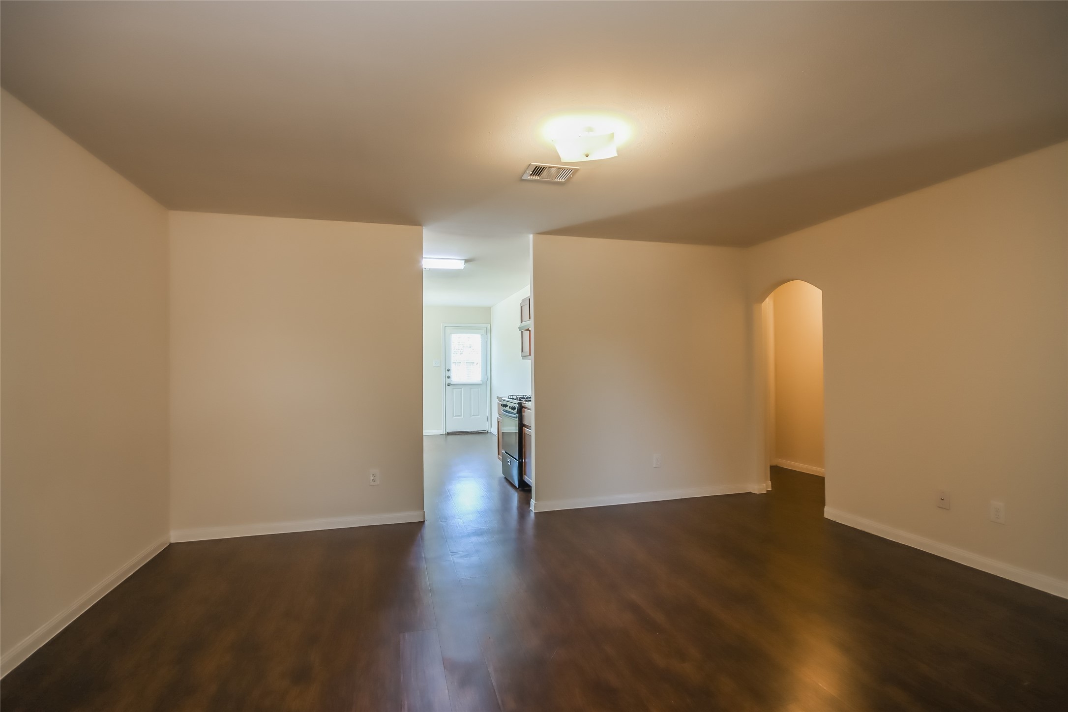 13022 Ristina Circle Houston, TX 77048 - Photo 6 of 15 a view of a room with wooden floor and a sink