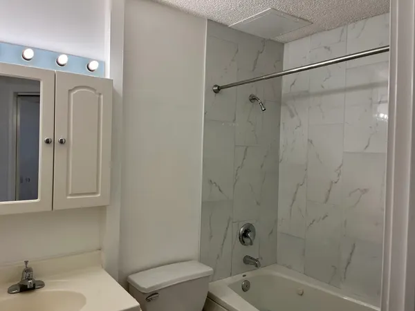 a bathroom with a sink and a bathtub