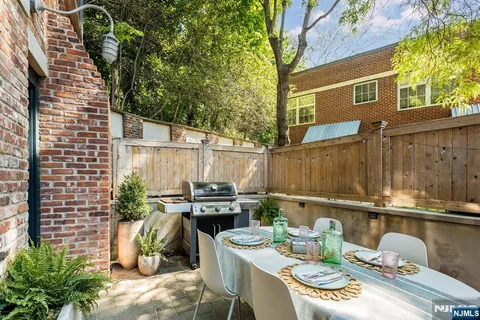 a outdoor space with a couch and chairs