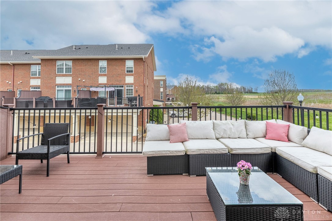 407 Brownstone Row Springboro, OH 45066 - Photo 44 of 54 This spacious outdoor deck provides an inviting area for relaxation and enjoying scenic views.