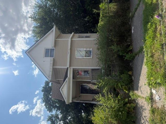 4733 Casper Street Detroit, MI 48210 - Photo 1 of 14 Two-story residence featuring light-colored siding and a contrasting white gable