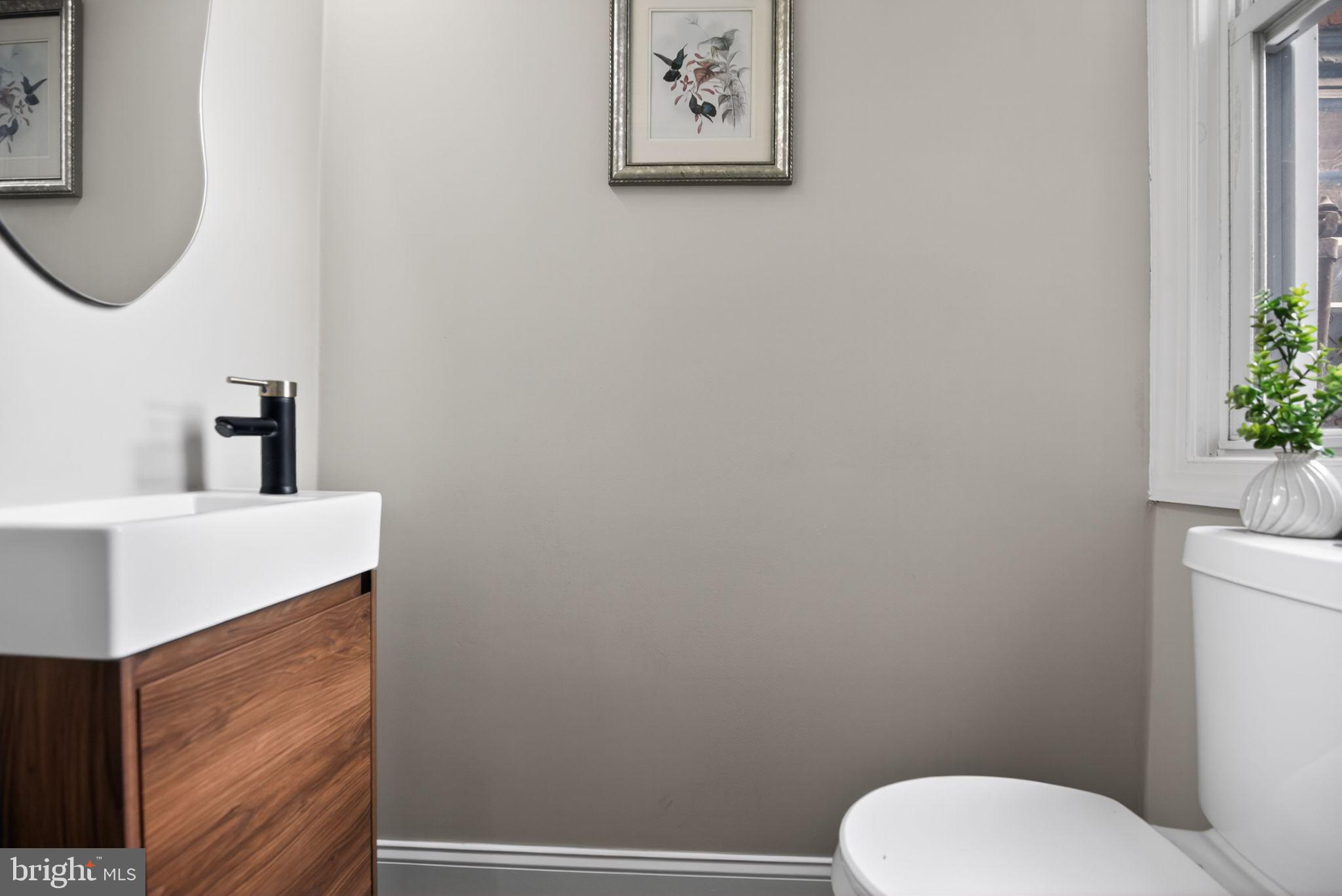 2014 Moore Street Philadelphia, PA 19145 - Photo 15 of 26 a bathroom with a toilet and a sink