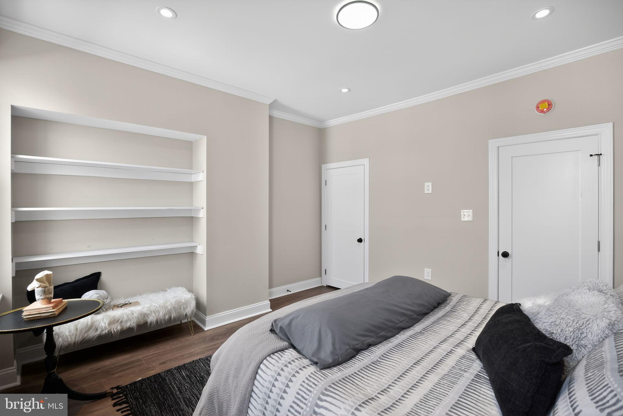 2014 Moore Street Philadelphia, PA 19145 - Photo 18 of 26 a bedroom with a bed and a window