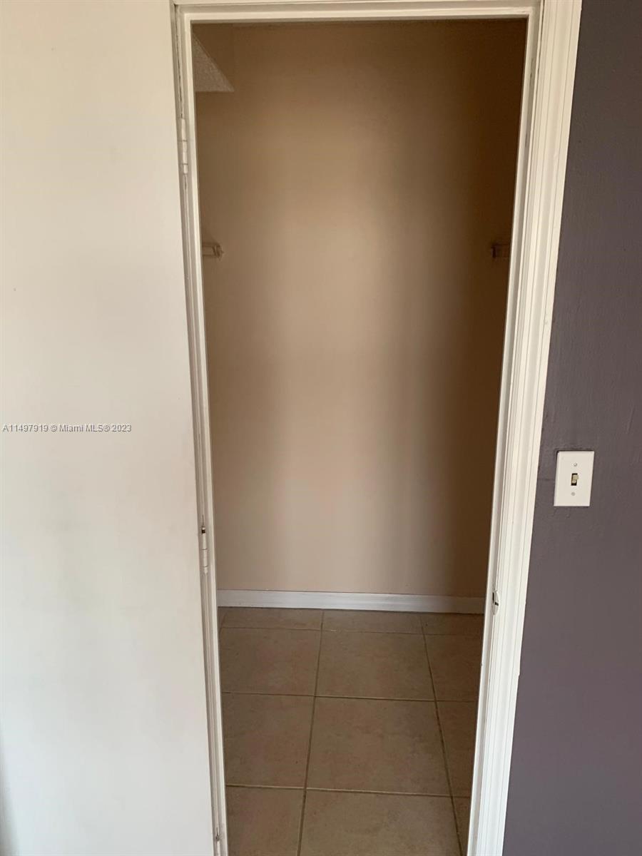 4174 Inverrary Drive, Unit 906 Lauderhill, FL 33319 - Photo 9 of 9 close up of a white marble wall