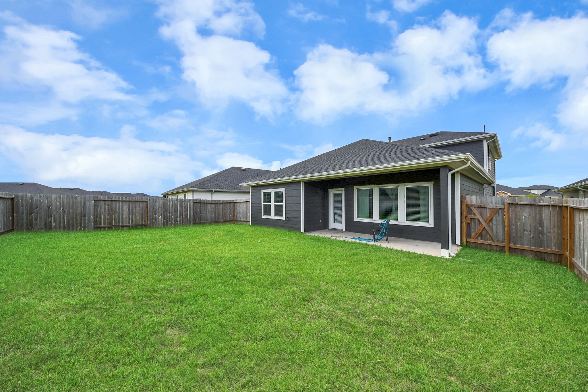 31738 Melkridge Road Fulshear, TX 77441 - Photo 30 of 33 Wonderful covered Patio perfect for those outdoor cook-outs!