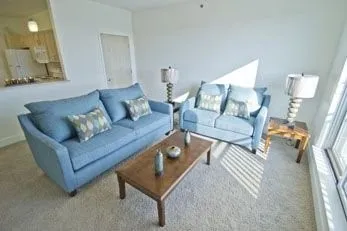 a living room with furniture and a couch