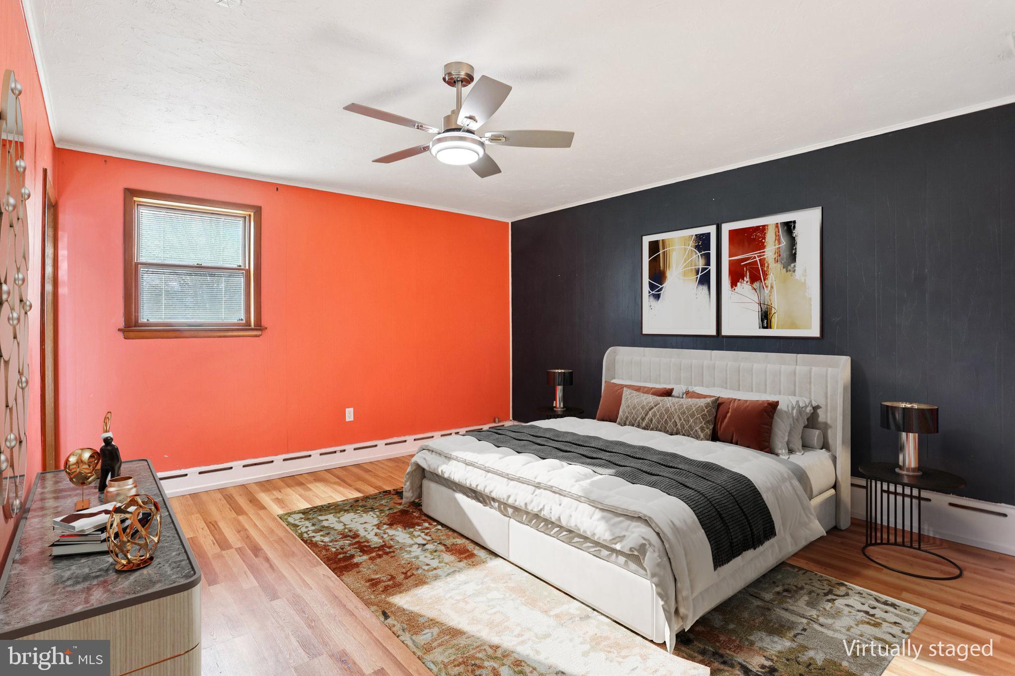 2614 Old Welsh Road Willow Grove, PA 19090 - Photo 14 of 47 a bedroom with a large bed and a chandelier