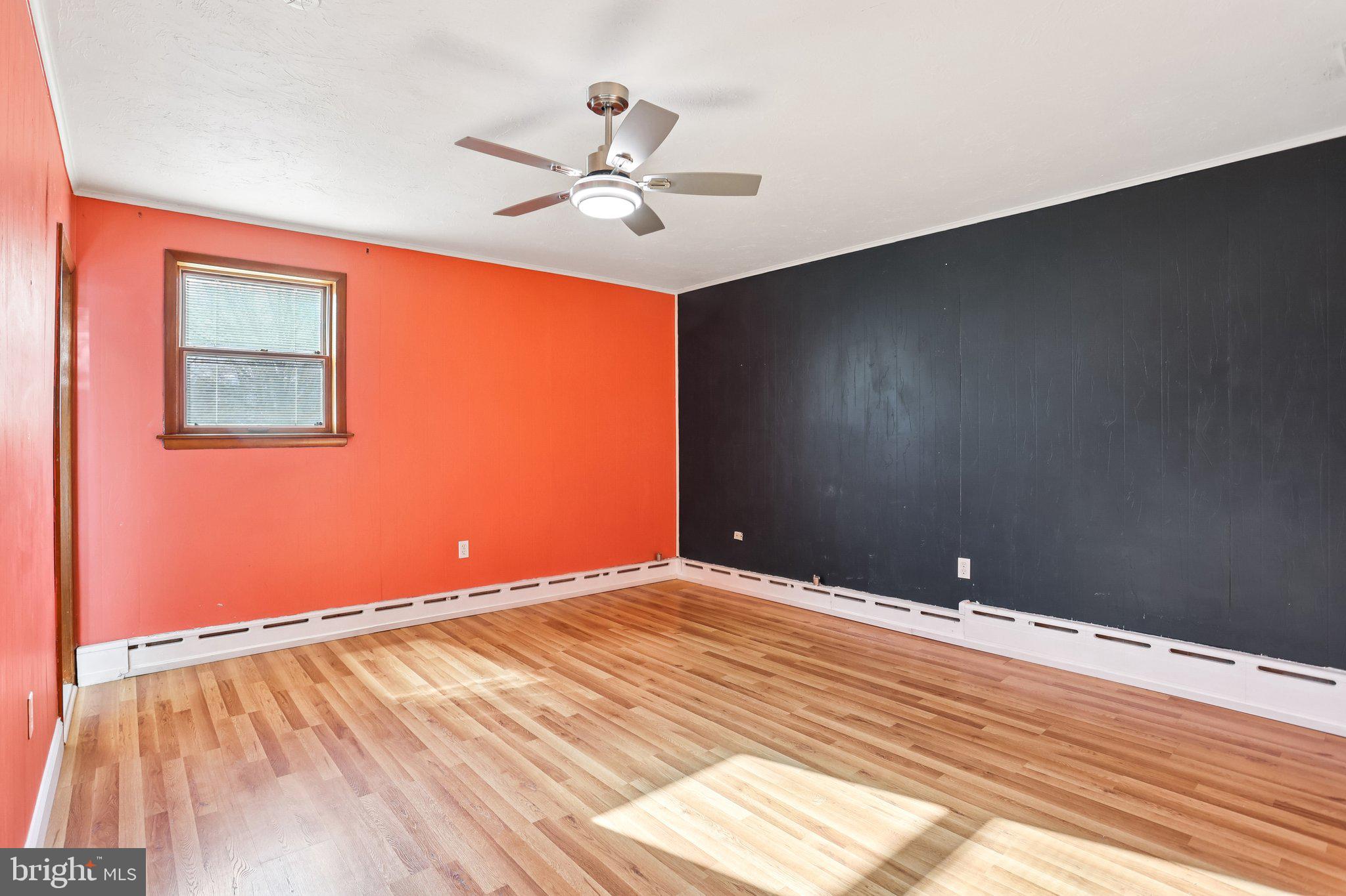 2614 Old Welsh Road Willow Grove, PA 19090 - Photo 15 of 47 a view of an empty room with wooden floor and a chandelier fan