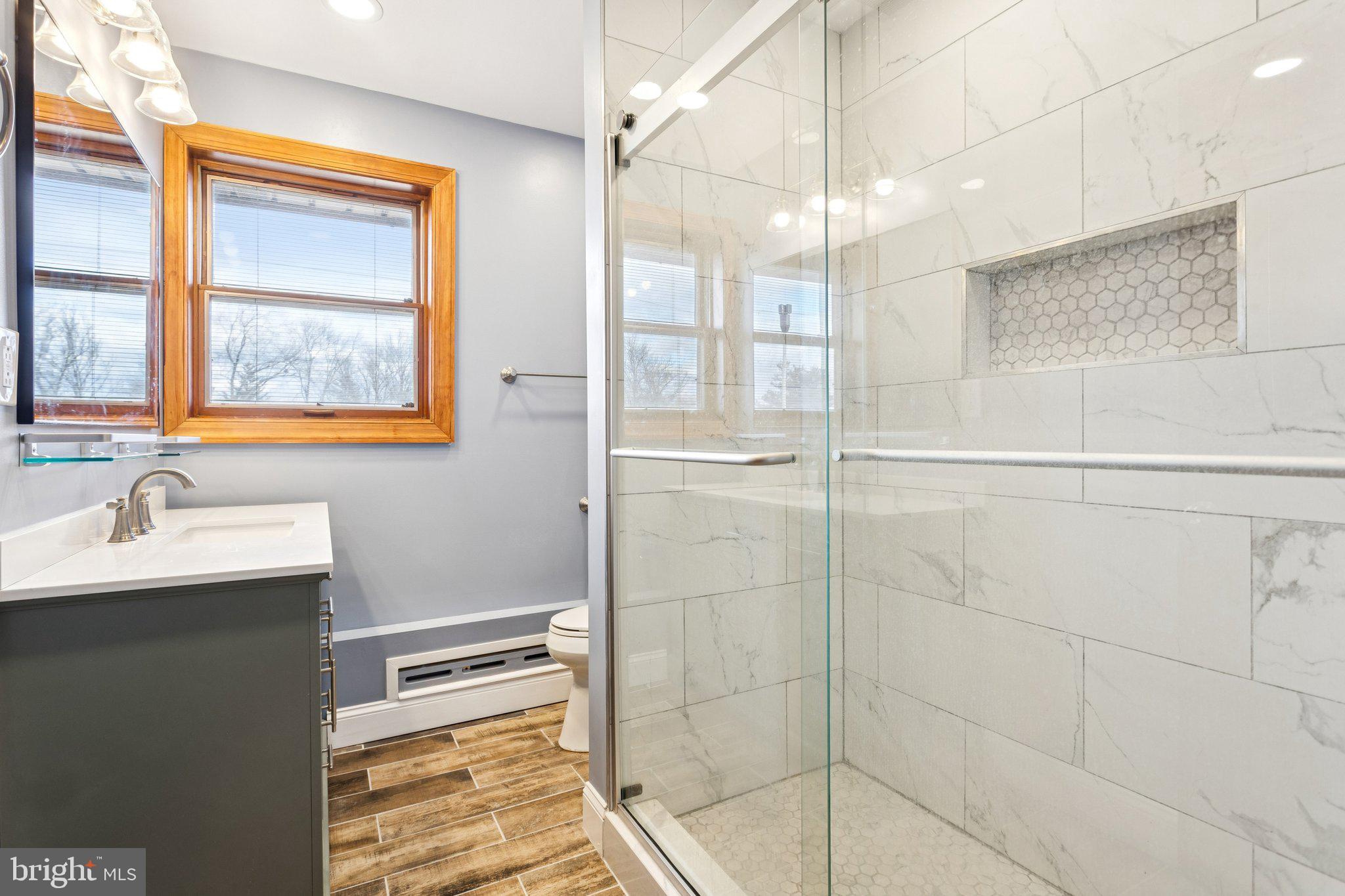 2614 Old Welsh Road Willow Grove, PA 19090 - Photo 22 of 47 a bathroom with a shower sink and mirror