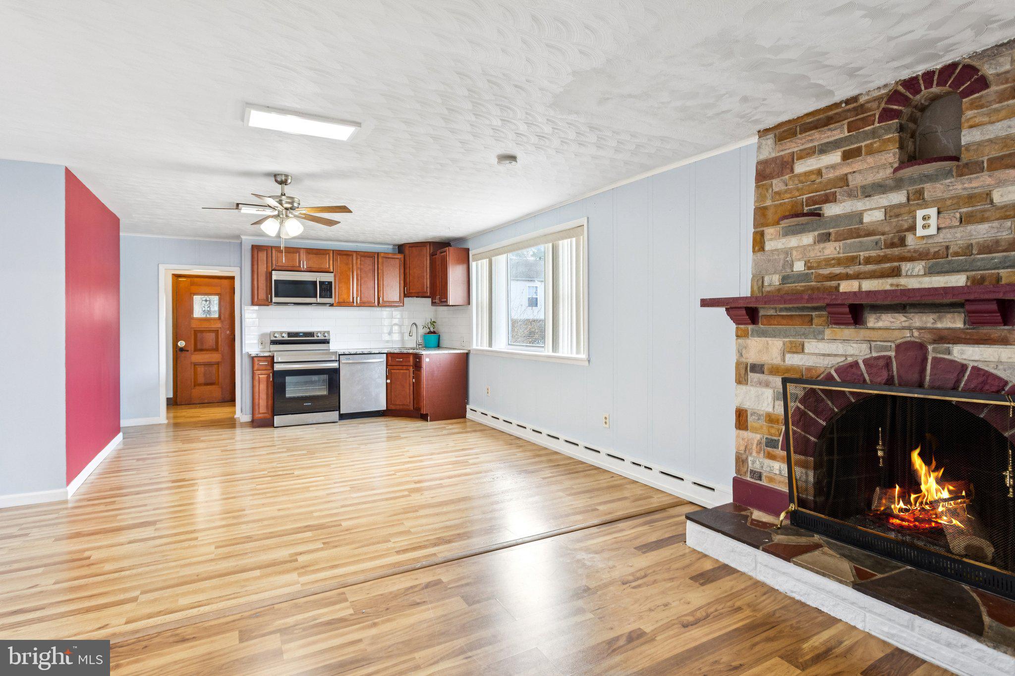 2614 Old Welsh Road Willow Grove, PA 19090 - Photo 29 of 47 a view of an empty room with a fireplace and window