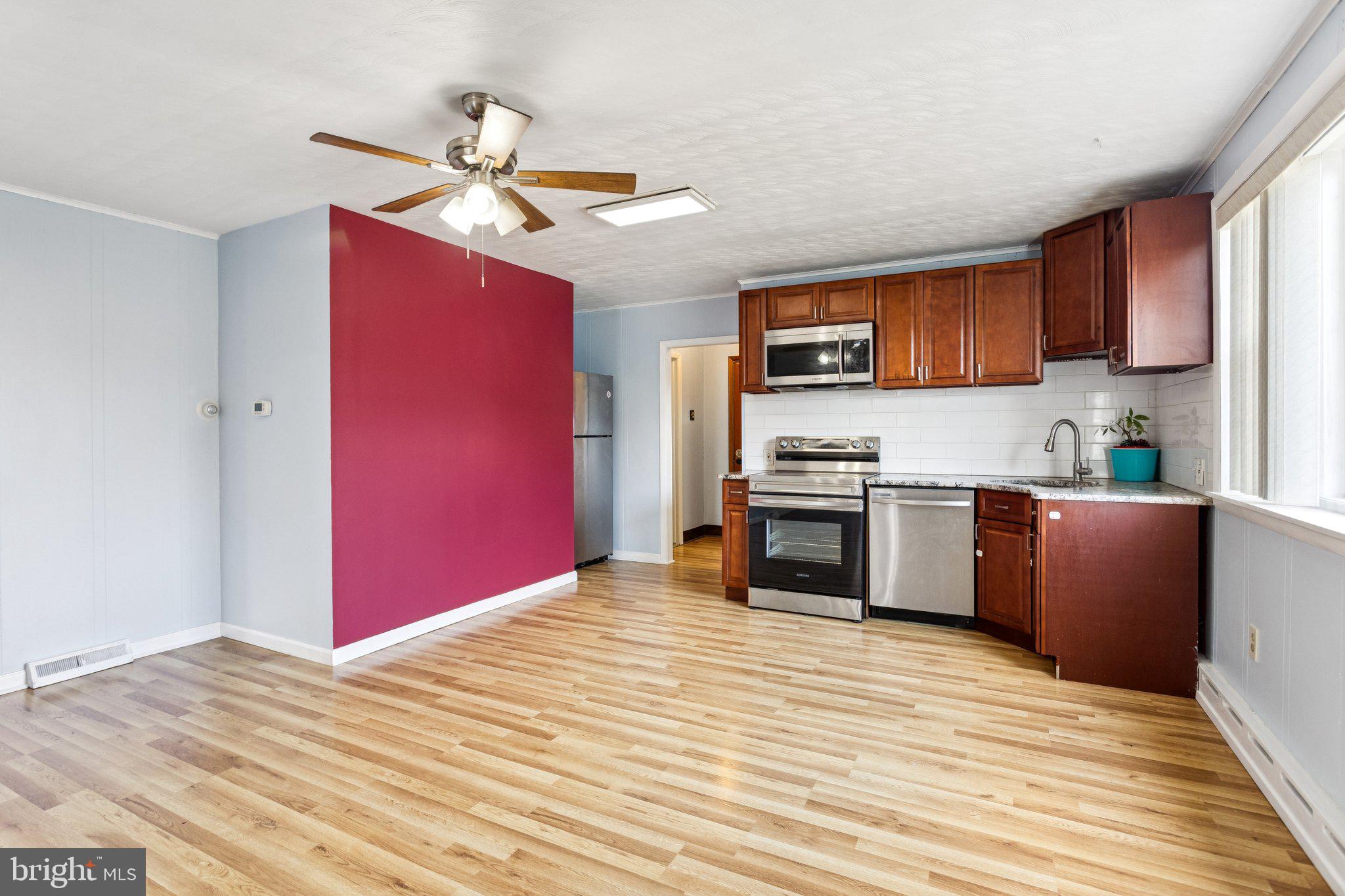 2614 Old Welsh Road Willow Grove, PA 19090 - Photo 32 of 47 a kitchen with stainless steel appliances granite countertop a sink stove and refrigerator