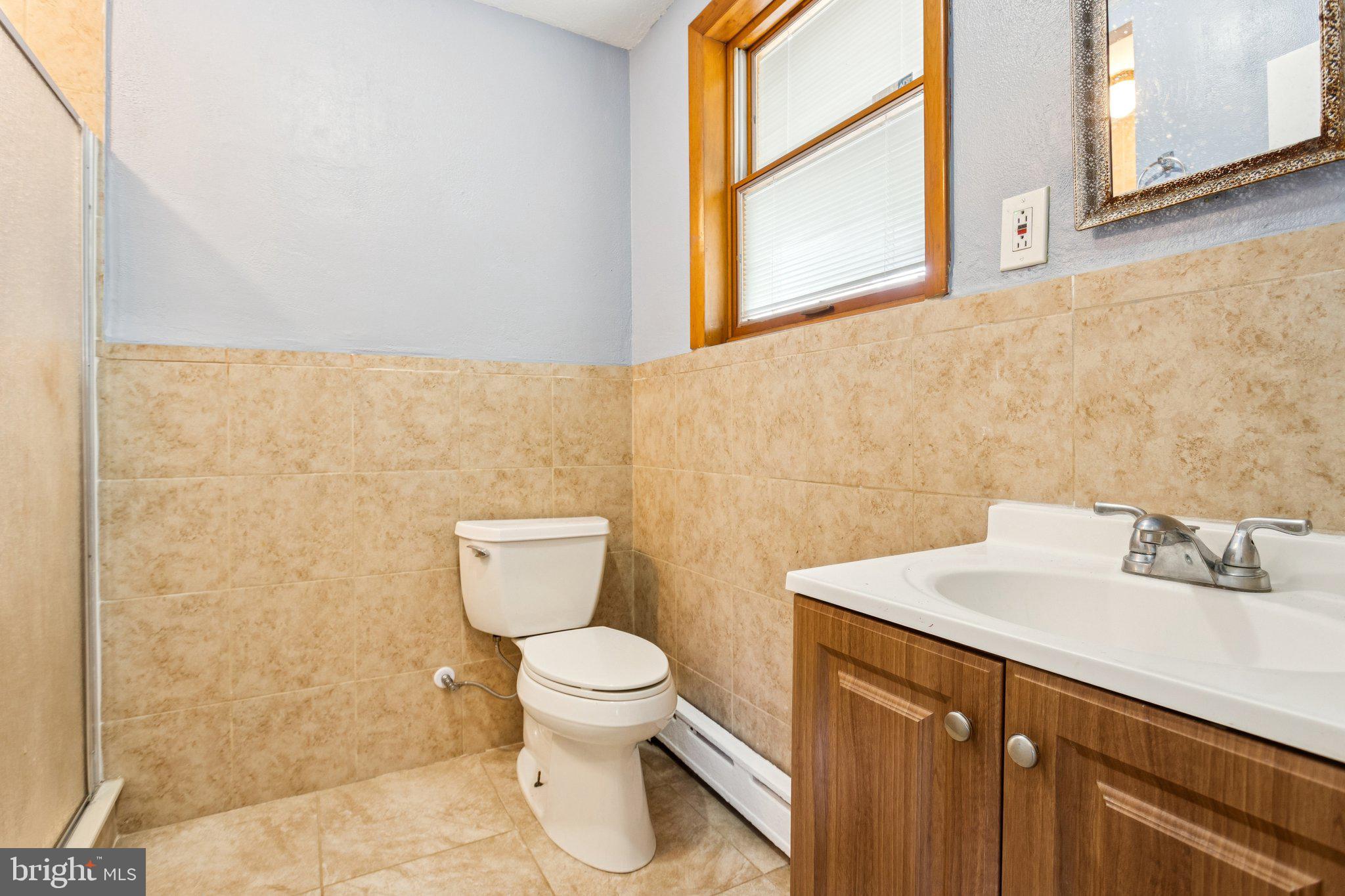 2614 Old Welsh Road Willow Grove, PA 19090 - Photo 36 of 47 a bathroom with a sink a toilet and a mirror