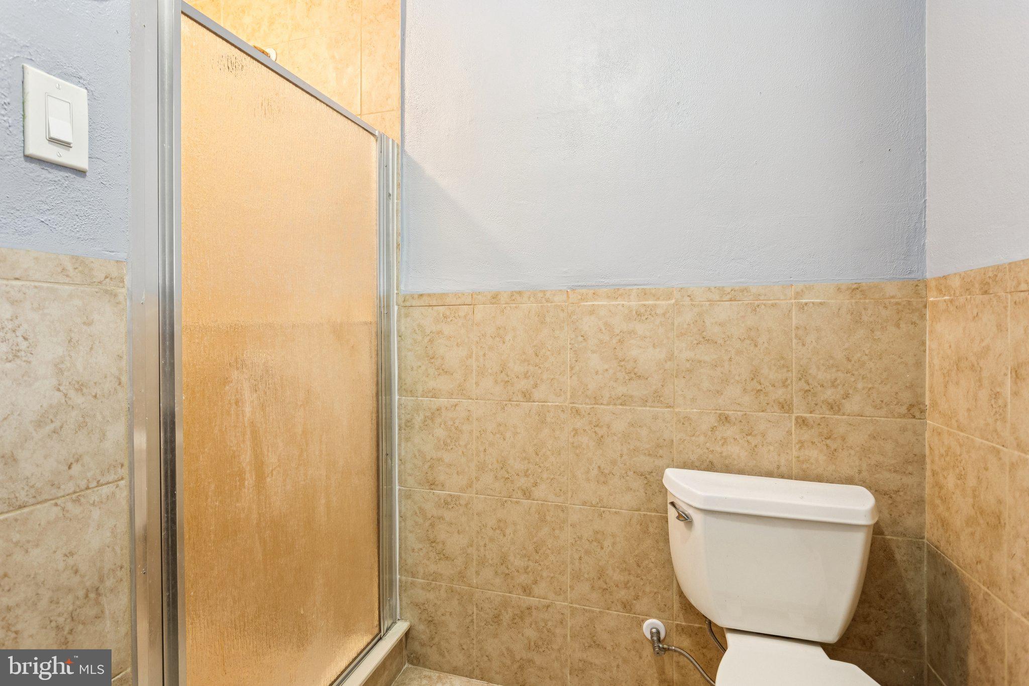 2614 Old Welsh Road Willow Grove, PA 19090 - Photo 37 of 47 a bathroom with a toilet and a shower