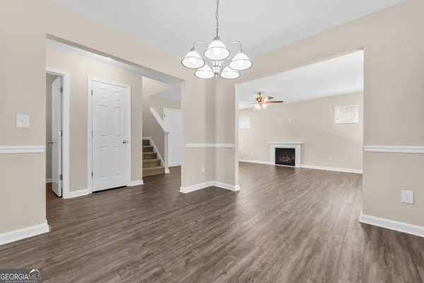 a view of a livingroom with wooden floor