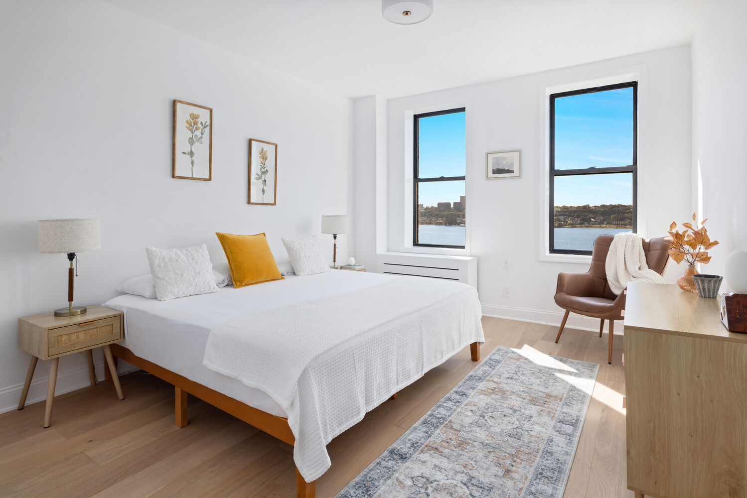 725 Riverside Drive, Unit 11A Manhattan, NY 10031 - Photo 11 of 21 a bedroom with a bed and wooden floor