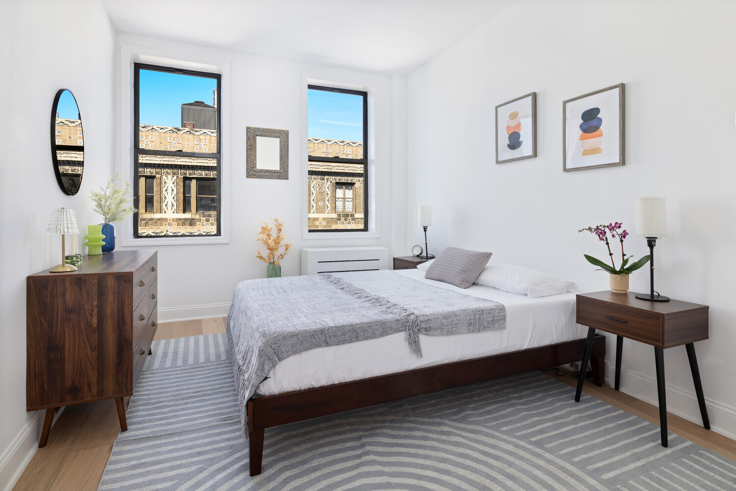 725 Riverside Drive, Unit 11A Manhattan, NY 10031 - Photo 14 of 21 a bedroom with bed and wooden floor