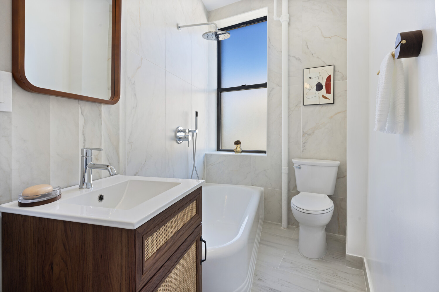 725 Riverside Drive, Unit 11A Manhattan, NY 10031 - Photo 17 of 21 a bathroom with a sink mirror vanity and toilet