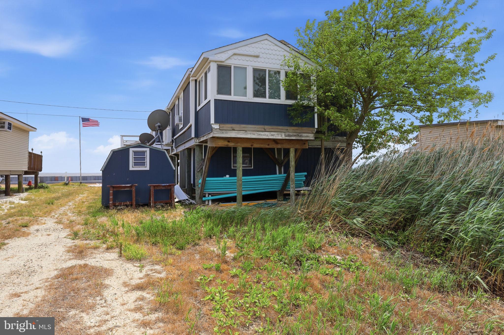 173 Cove Road Newport, NJ 08345 - Photo 49 of 72 a view of a house with a yard