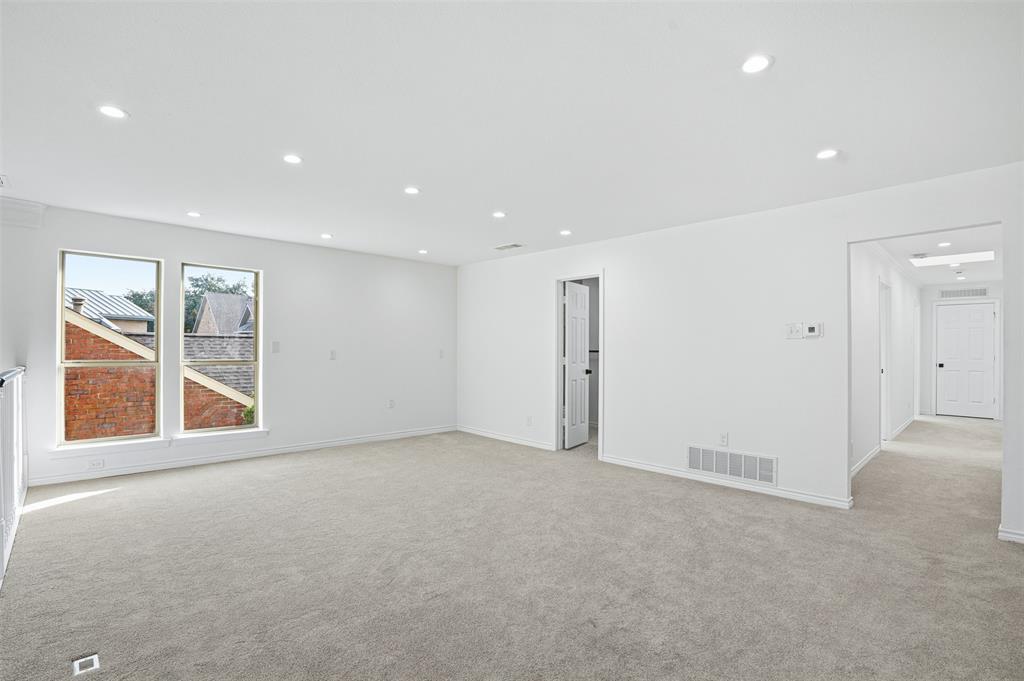 2 Parliament Place Dallas, TX 75225 - Photo 17 of 40 a view of an empty room with a window