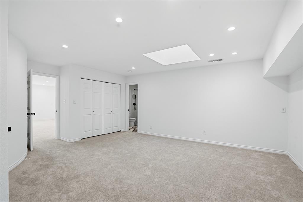 2 Parliament Place Dallas, TX 75225 - Photo 19 of 40 an empty room with a empty space and windows