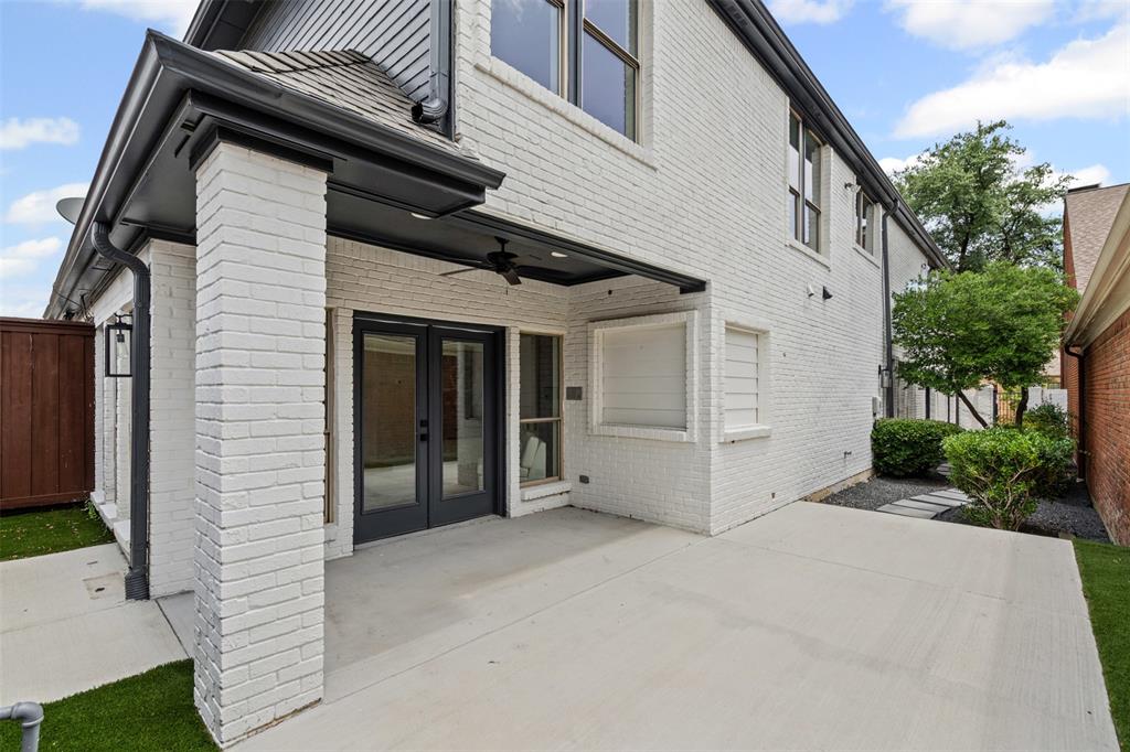 2 Parliament Place Dallas, TX 75225 - Photo 26 of 40 a view of a house with a garage
