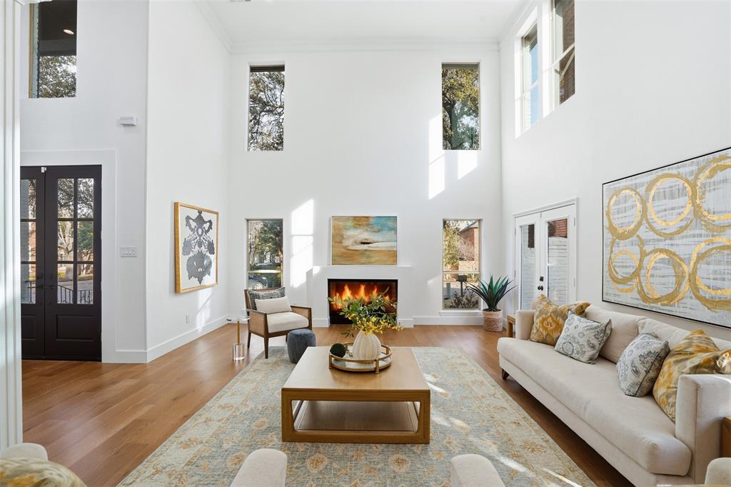 2 Parliament Place Dallas, TX 75225 - Photo 4 of 40 a living room with furniture fireplace and wooden floor
