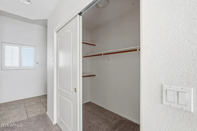 a view of a room with racks on the wall