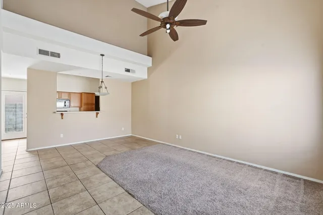 a view of a kitchen with a dishwasher and cabinets
