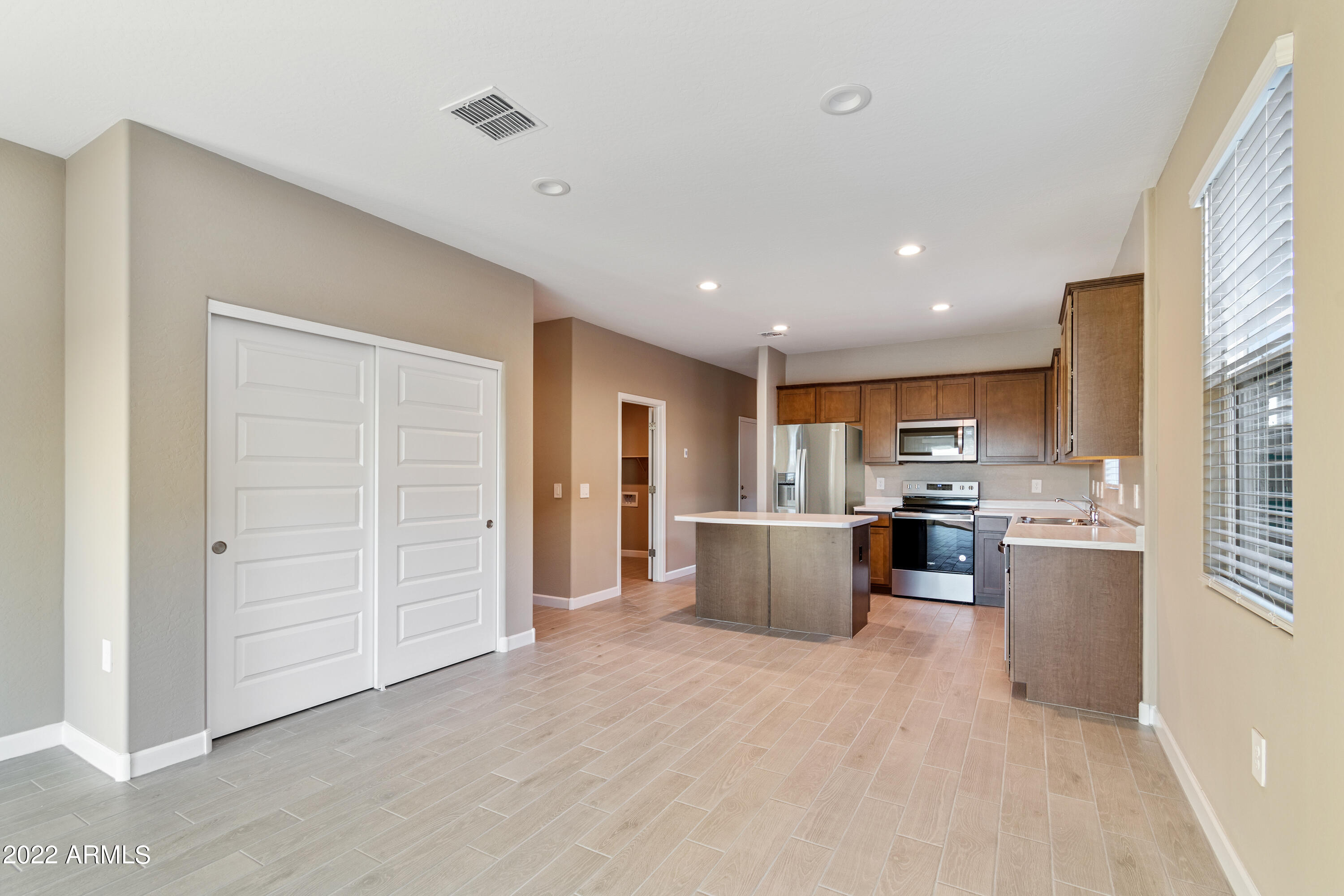 24093 West Zak Road Buckeye, AZ 85326 - Photo 21 of 52 3743_Cardinal_Desert Moon_Buckeye_AZ_DRH