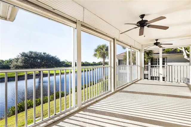 a view of a balcony with wooden floor