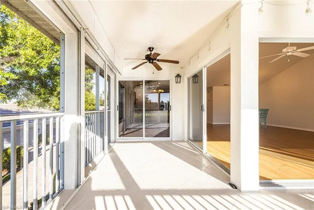 a view of porch with a floor to ceiling window and a floor to ceiling window
