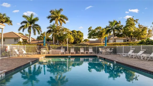 a view of a lake with a house
