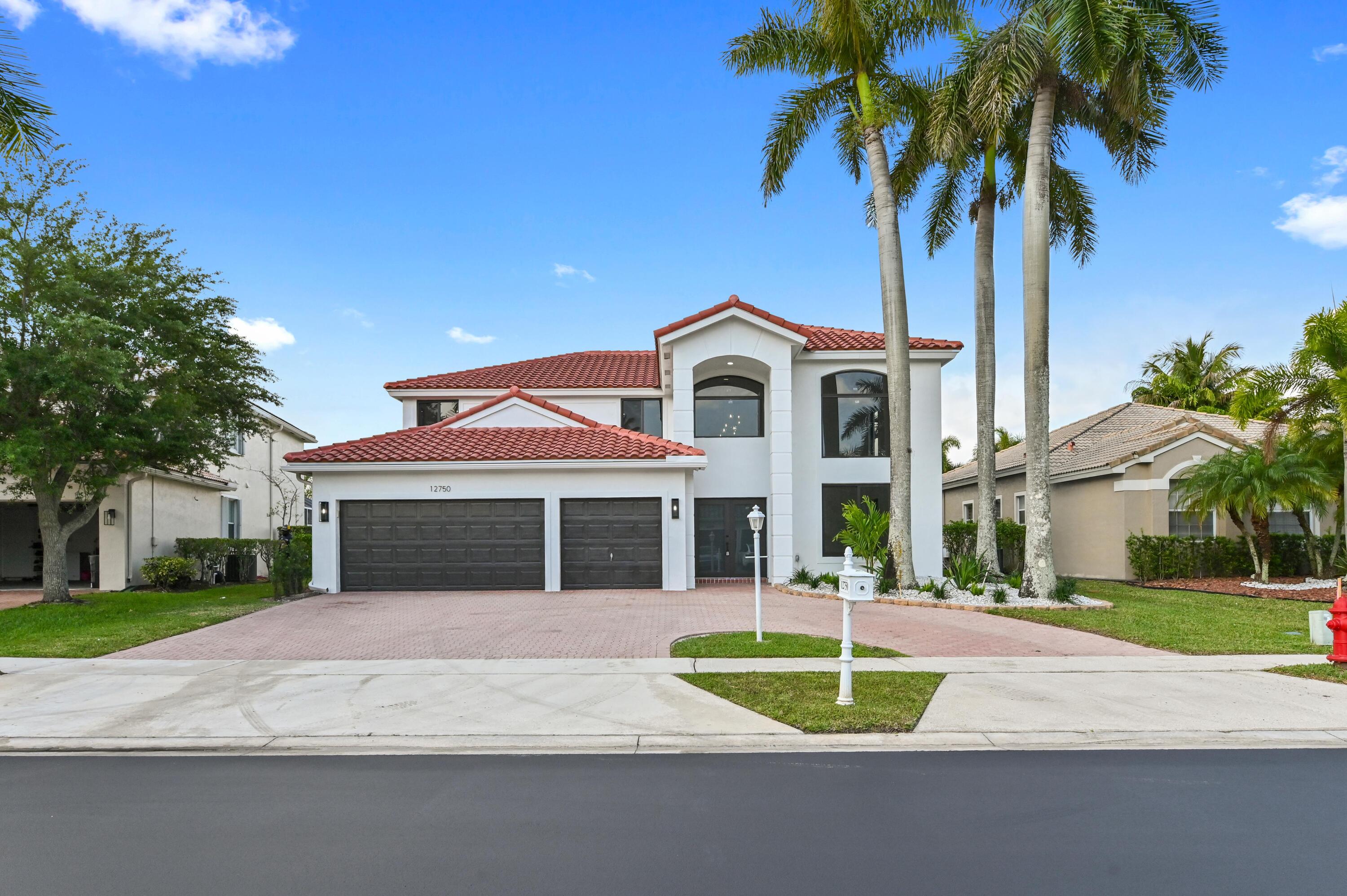 12750 Yardley Drive Boca Raton, FL 33428 - Photo 1 of 54 01 Front 01
