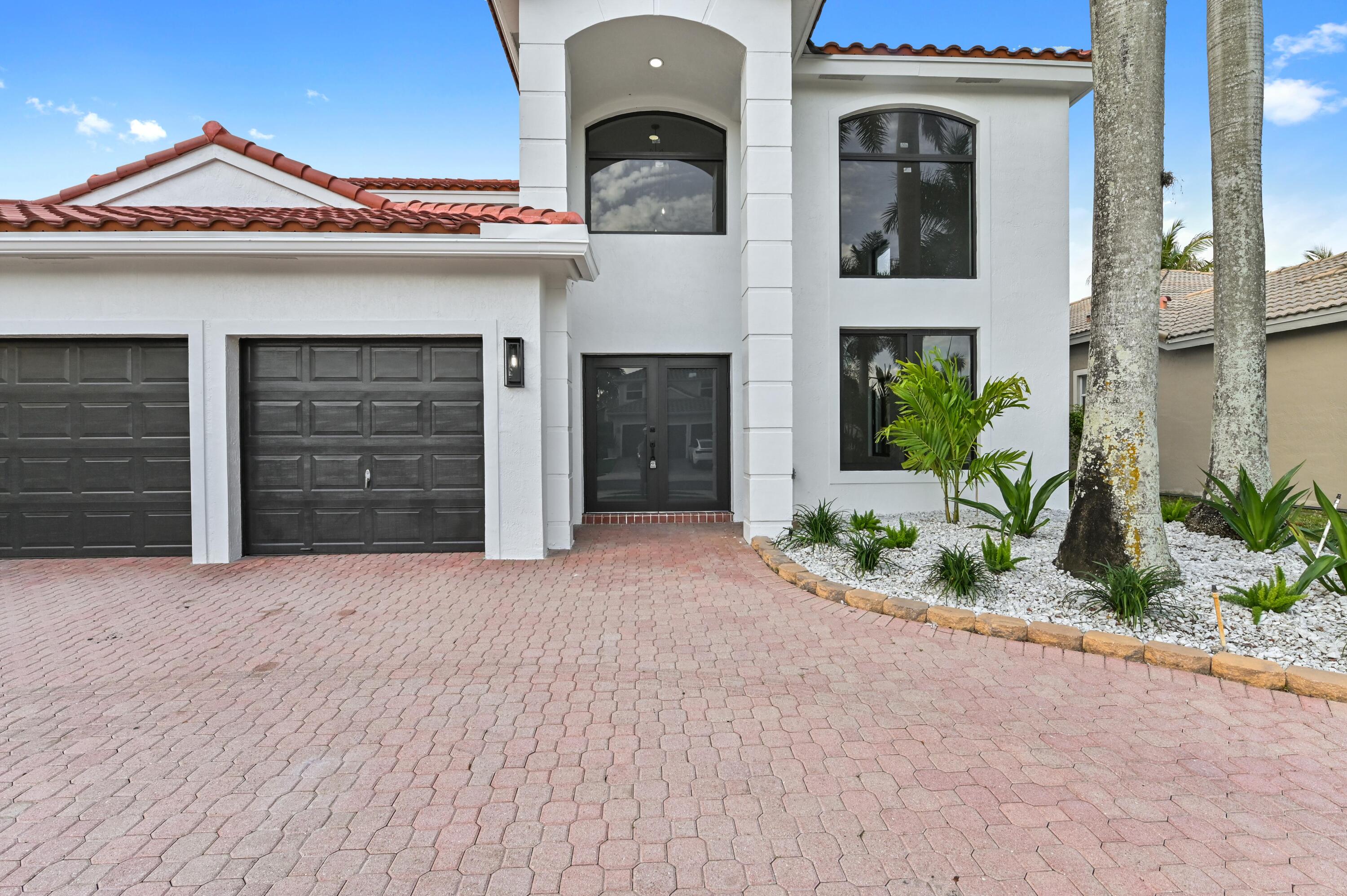 12750 Yardley Drive Boca Raton, FL 33428 - Photo 2 of 54 02 Front 02