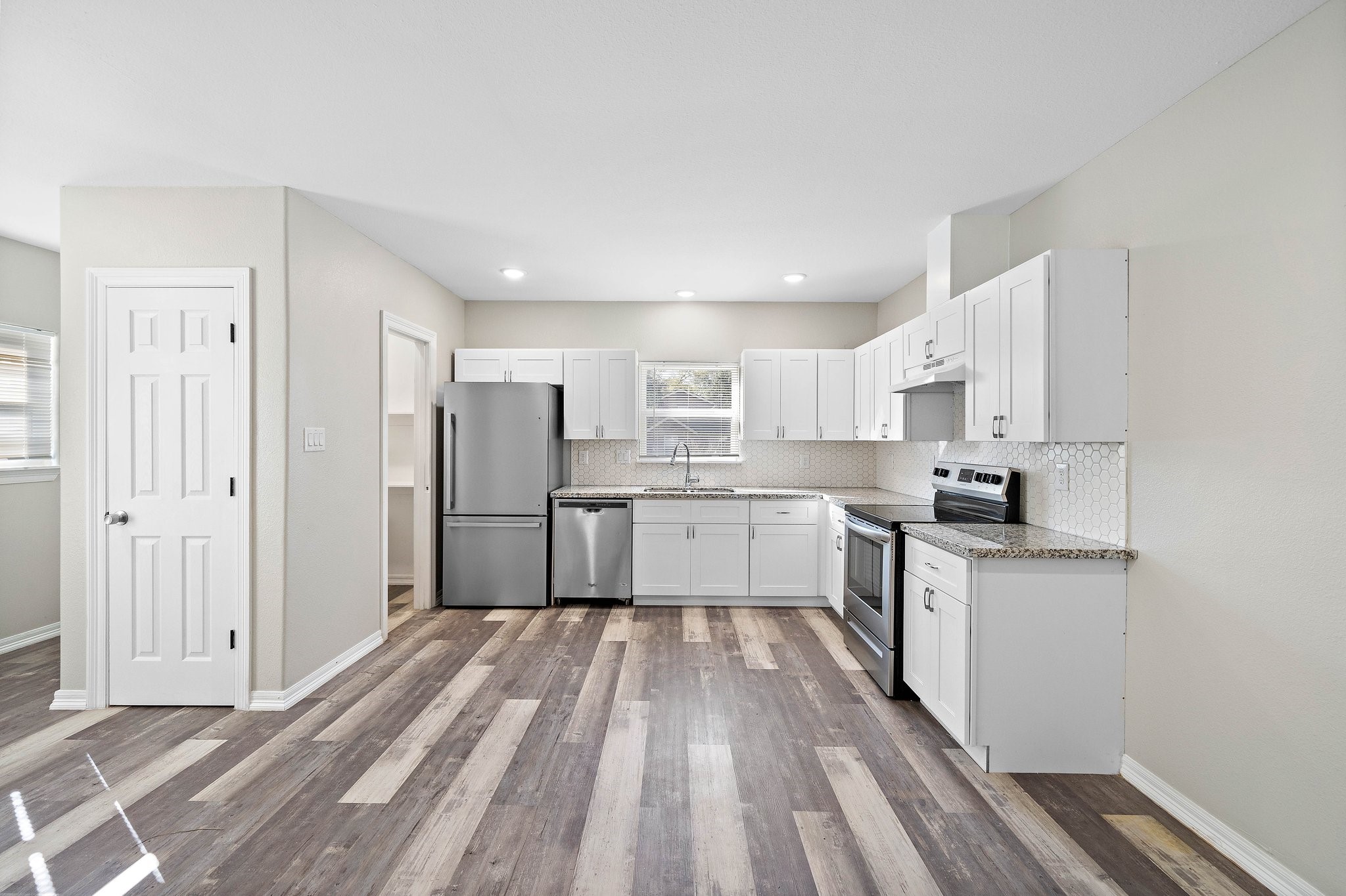 Light and bright kitchen with plenty of storage
