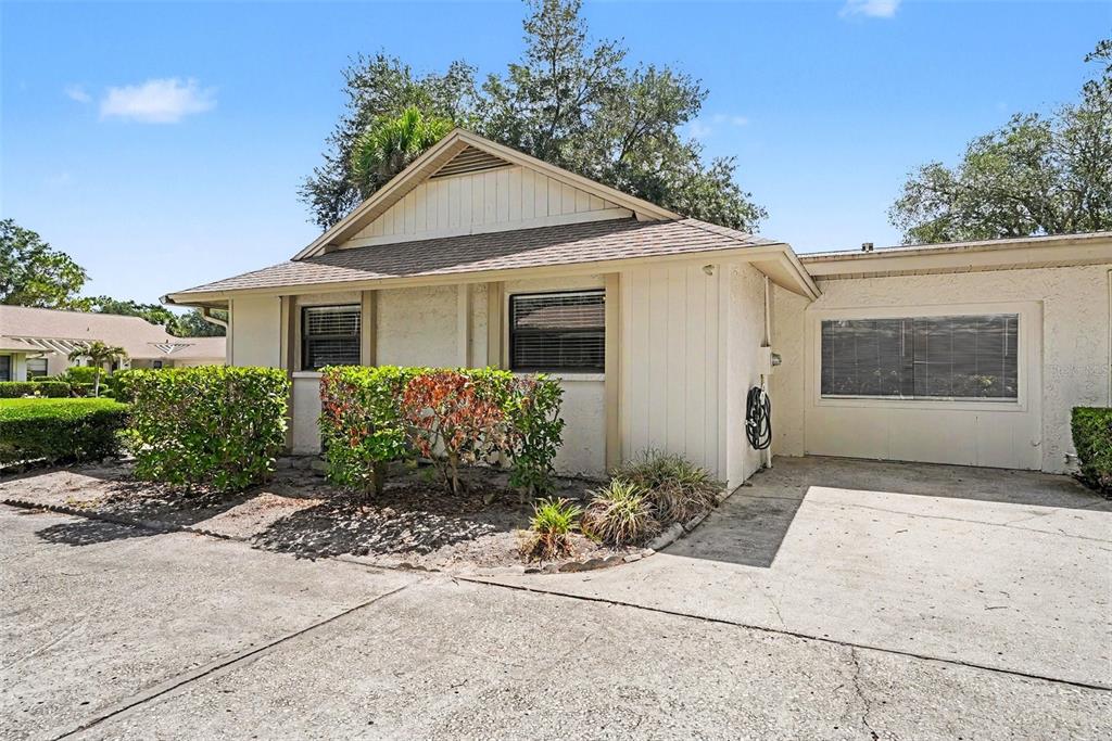9204 Golf View Drive New Port Richey, FL 34655 - Photo 2 of 33 a front view of a house with a yard