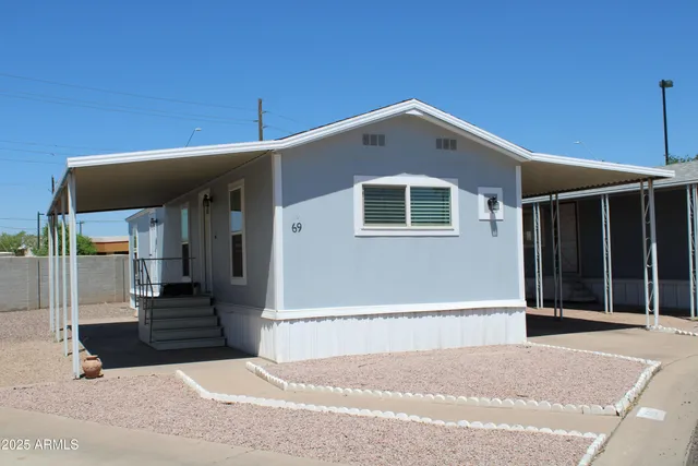 a front view of a house with a garage